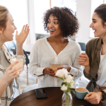 women friendships lead to healthier bodies and minds. Friends enjoying coffee.