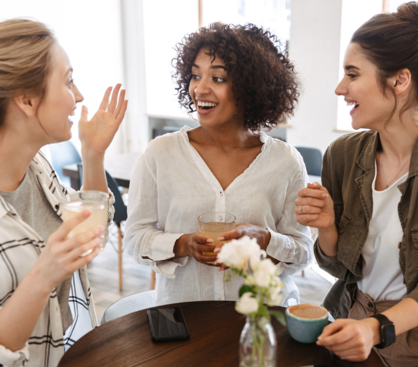 women friendships lead to healthier bodies and minds. Friends enjoying coffee.