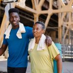 woman and son out for a self-care walk, moving their bodies and spending quality time together