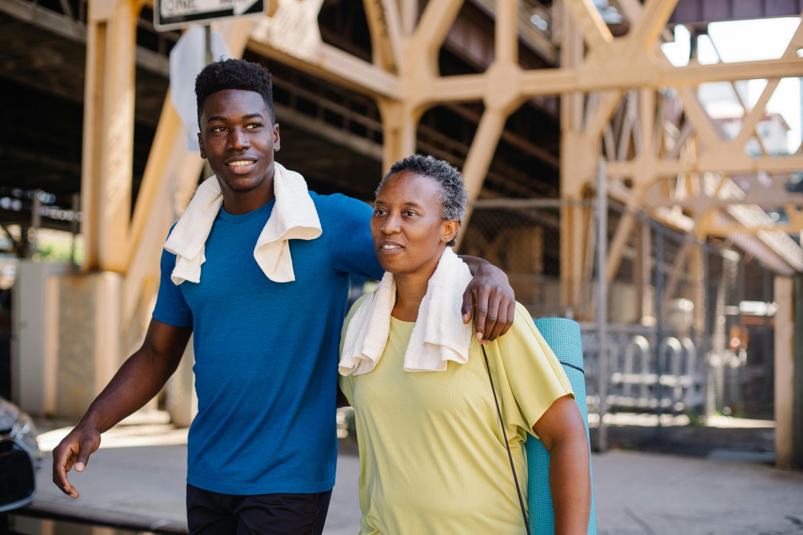 woman and son out for a self-care walk, moving their bodies and spending quality time together